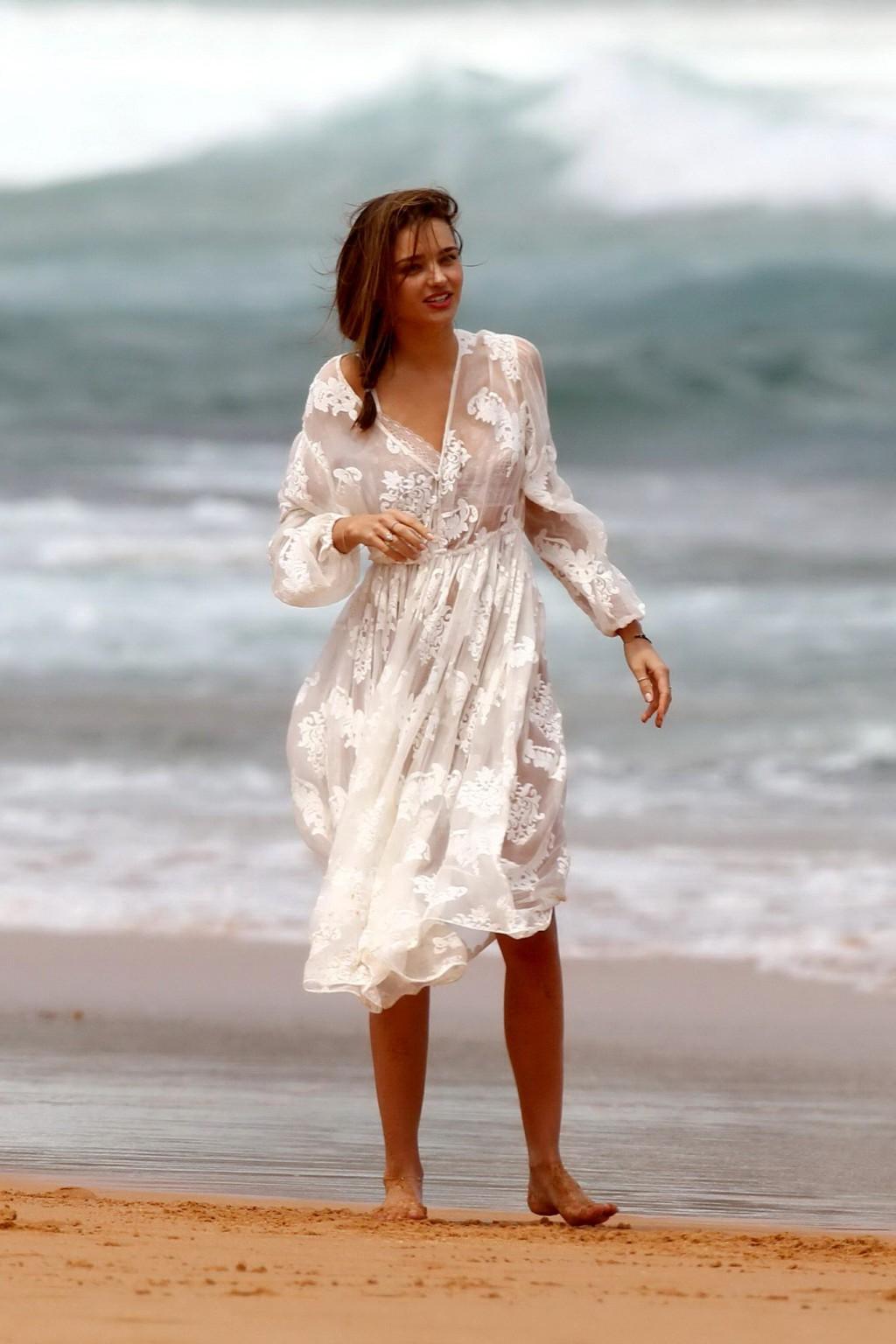 10P Miranda Kerr flashing her pussy in see through panties at the Kora Organics phot