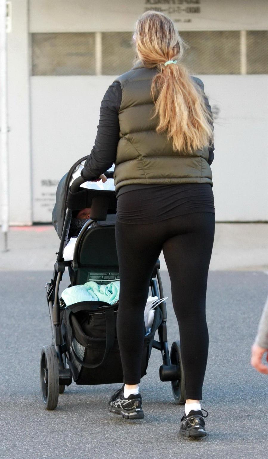 10P Elizabeth Berkley shows off her ass wearing a see through tights out in Beverly 