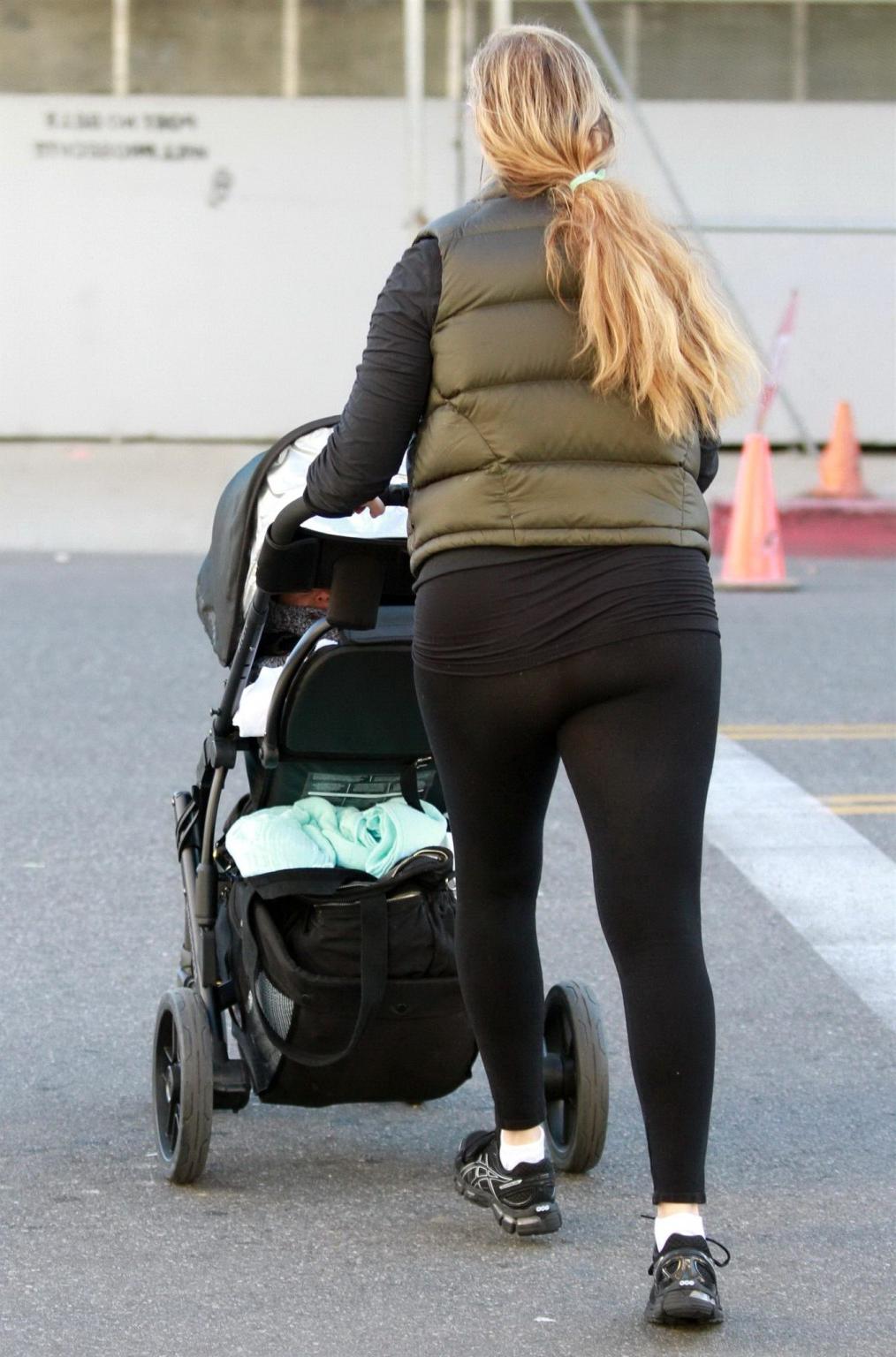 10P Elizabeth Berkley shows off her ass wearing a see through tights out in Beverly 