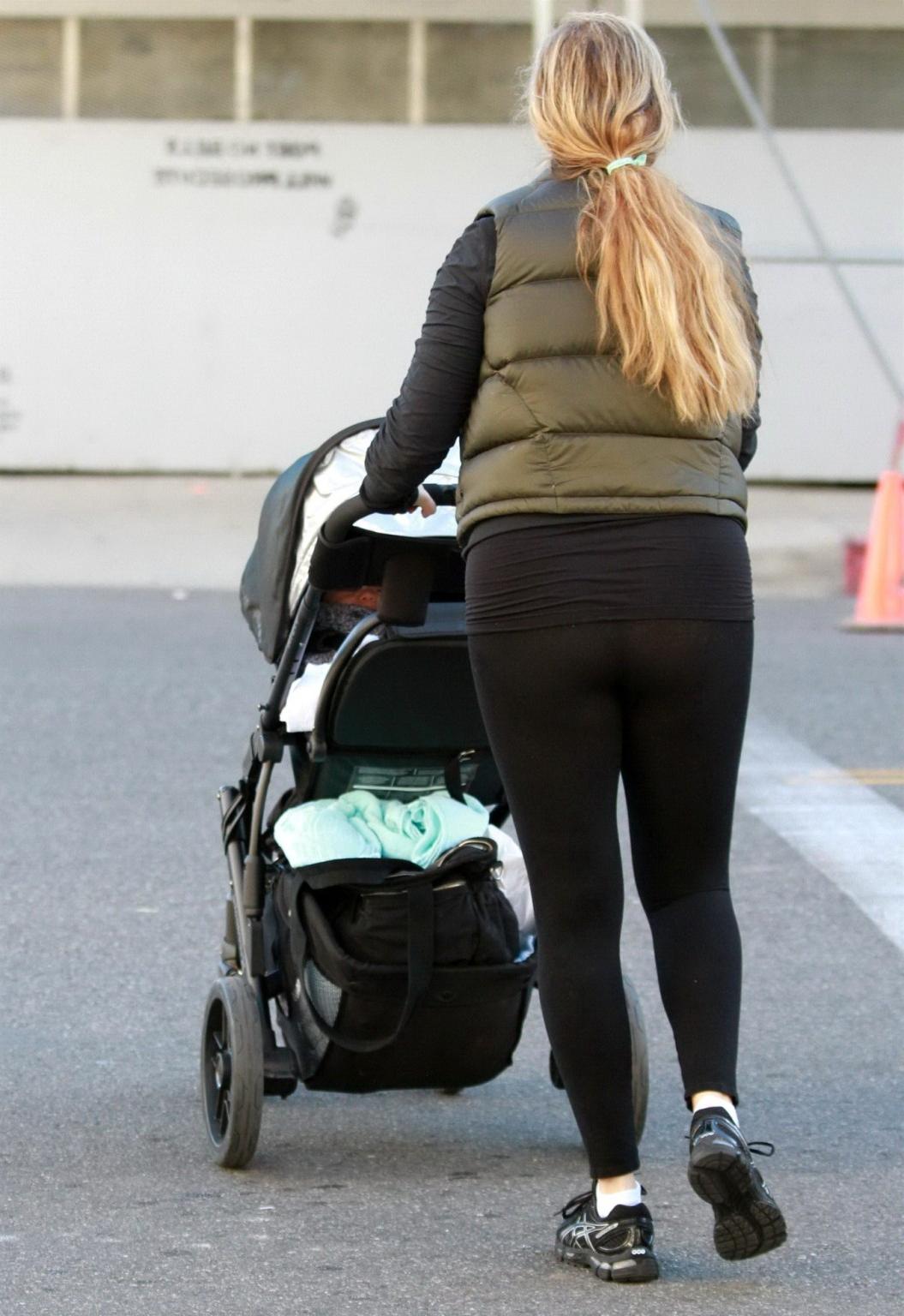 10P Elizabeth Berkley shows off her ass wearing a see through tights out in Beverly 