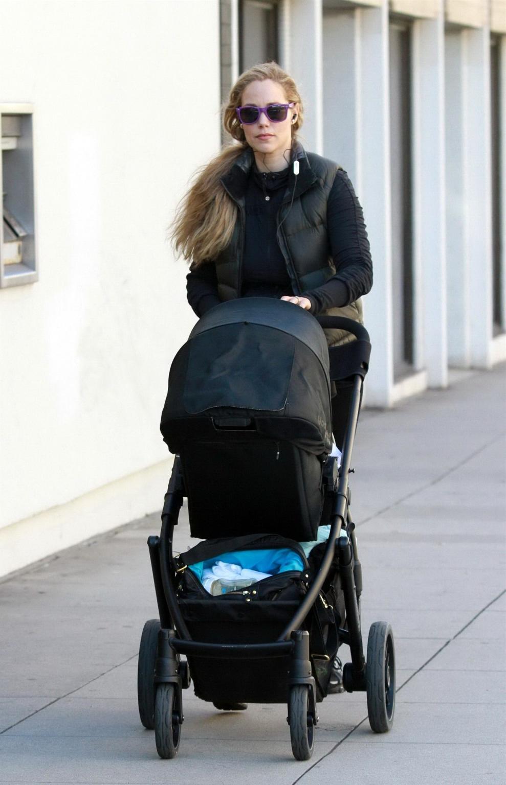 10P Elizabeth Berkley shows off her ass wearing a see through tights out in Beverly 