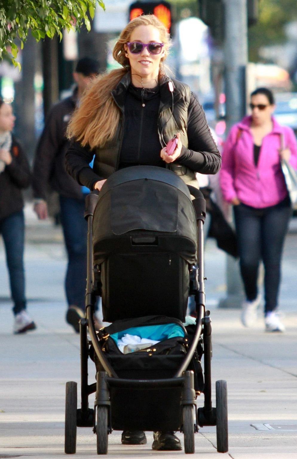 10P Elizabeth Berkley shows off her ass wearing a see through tights out in Beverly 