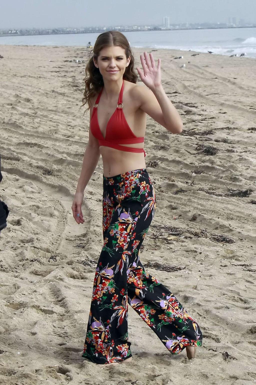 10P AnnaLynne McCord wearing a red bikini top on the set of '90210' in Huntington Be