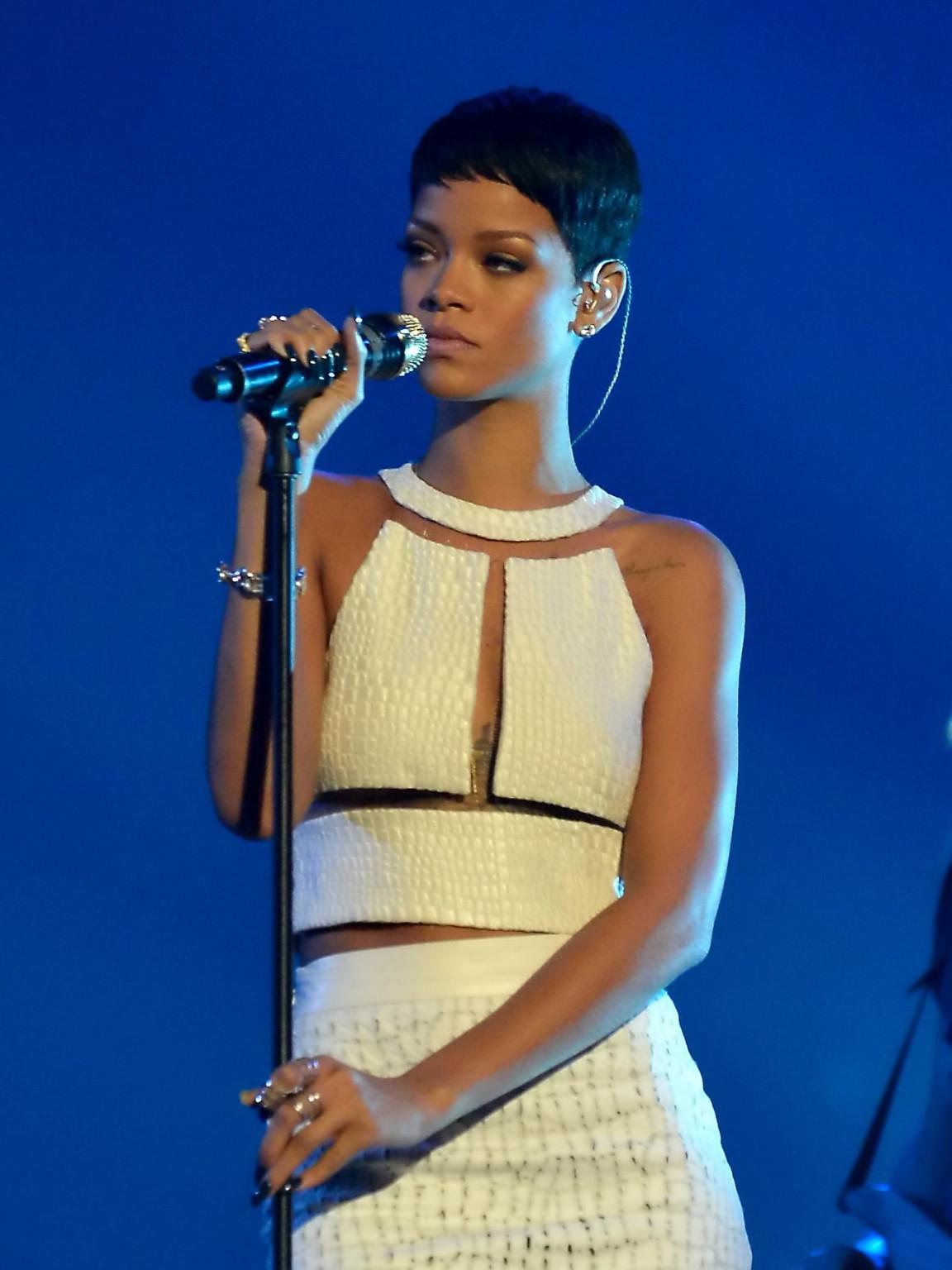 10P Rihanna in partially see through dress performing on The X Factor Final in Manch