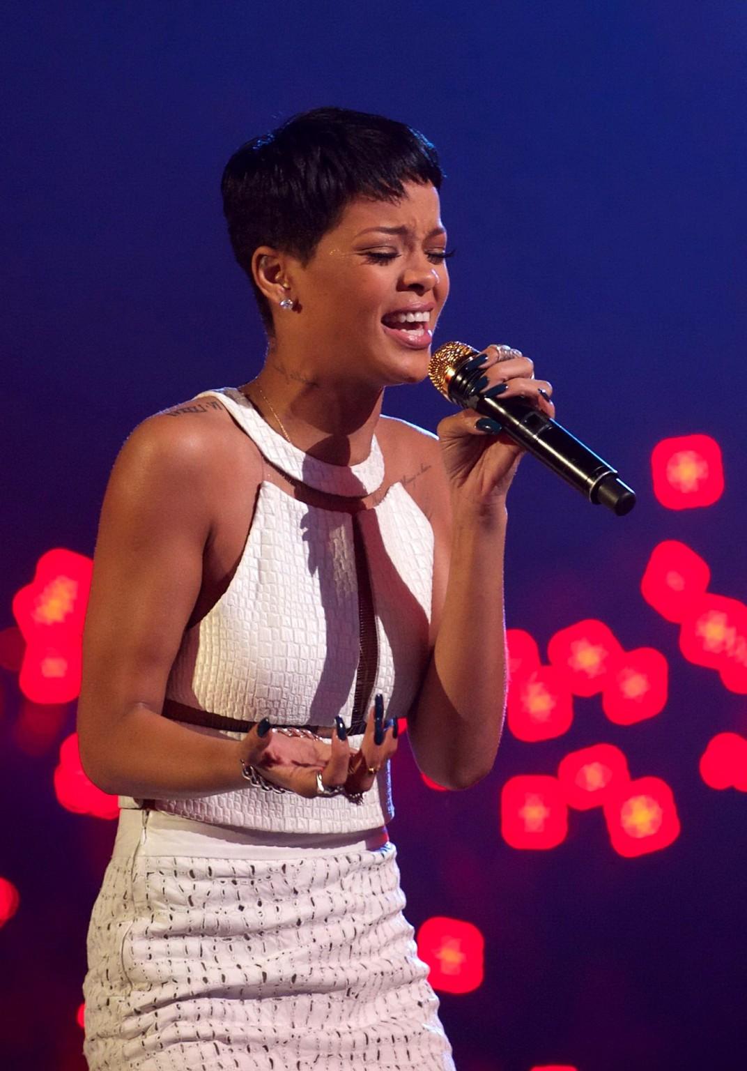 10P Rihanna in partially see through dress performing on The X Factor Final in Manch