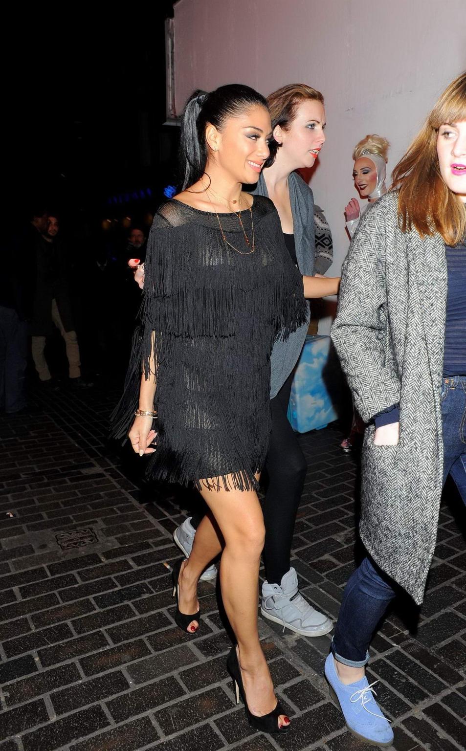 10P Nicole Scherzinger wearing a partially see through dress outside the Nobu Berkel
