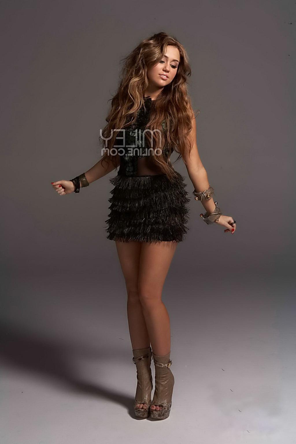 10P Miley Cyrus braless wearing various see-through outfit at Gypsy Heart Tour photo