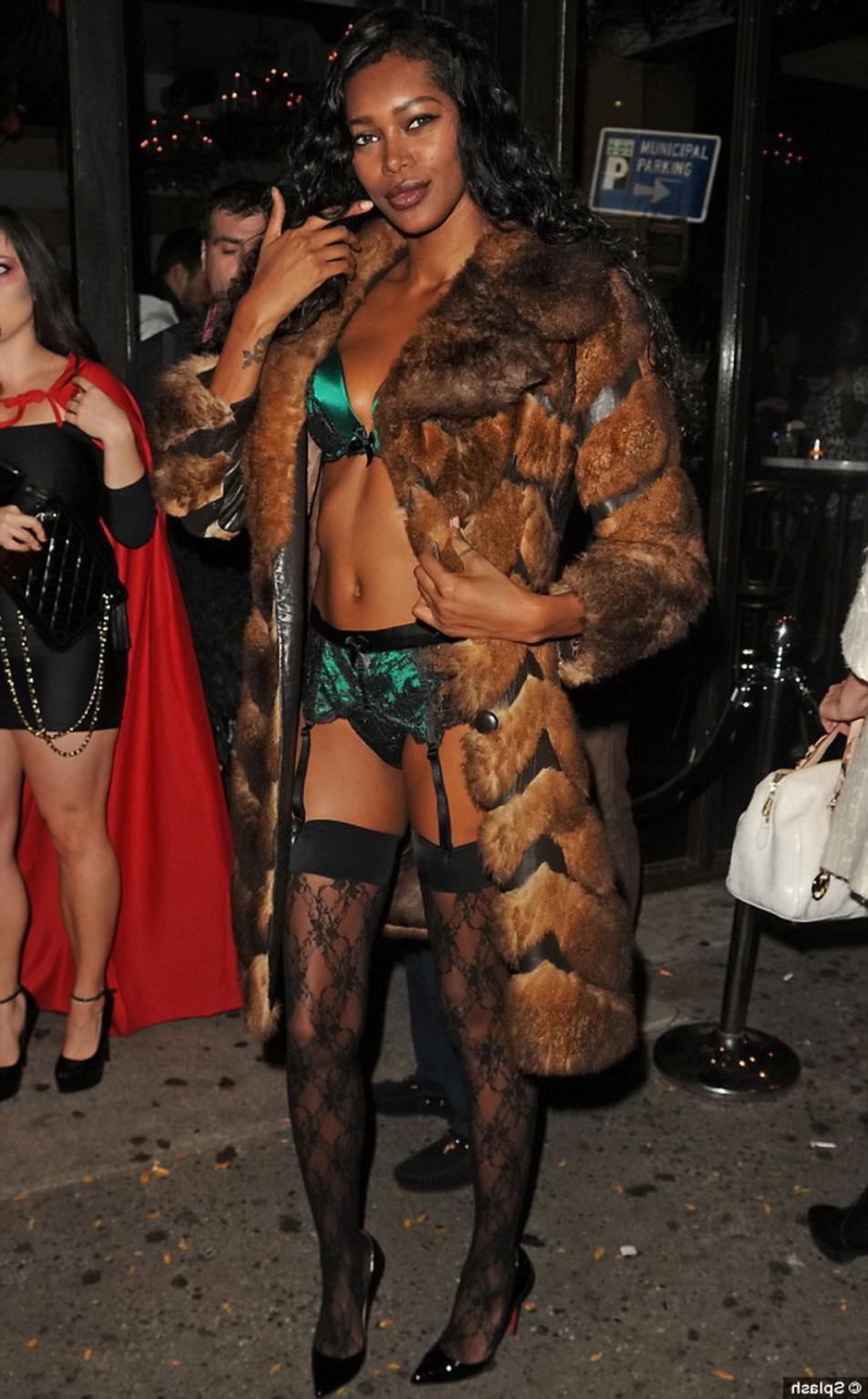 9P Jessica White arrived in underwear, stockings and wings to host a Halloween ling