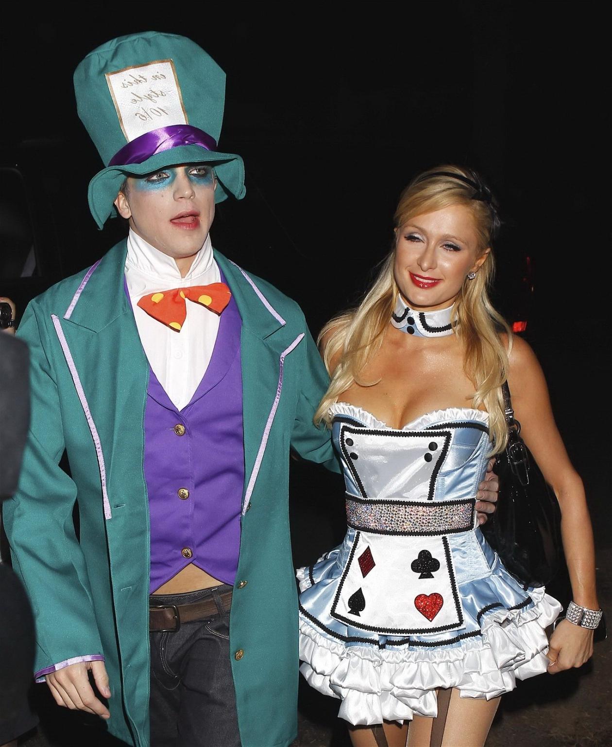 10P Paris Hilton dressed as Alice in Slutland for a Halloween party in Beverly Hills