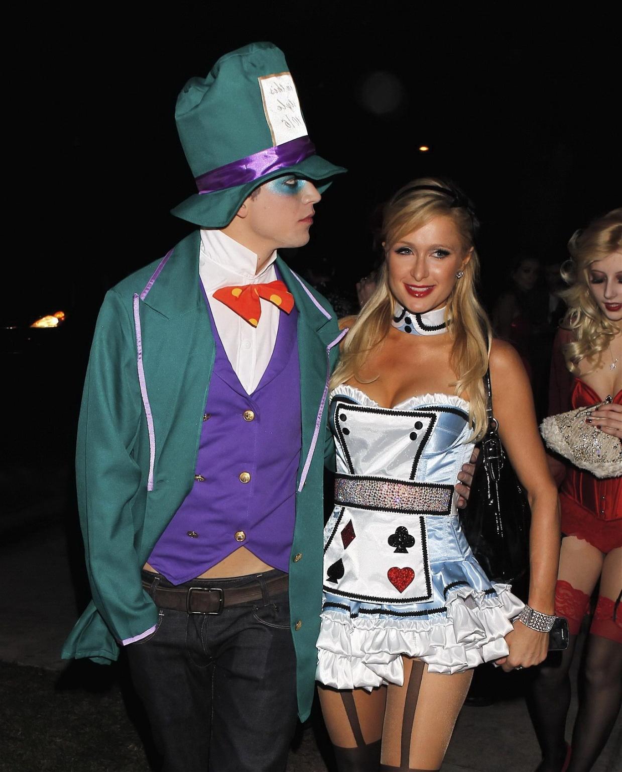 10P Paris Hilton dressed as Alice in Slutland for a Halloween party in Beverly Hills