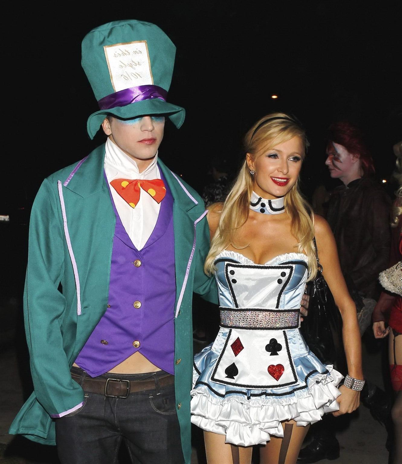 10P Paris Hilton dressed as Alice in Slutland for a Halloween party in Beverly Hills