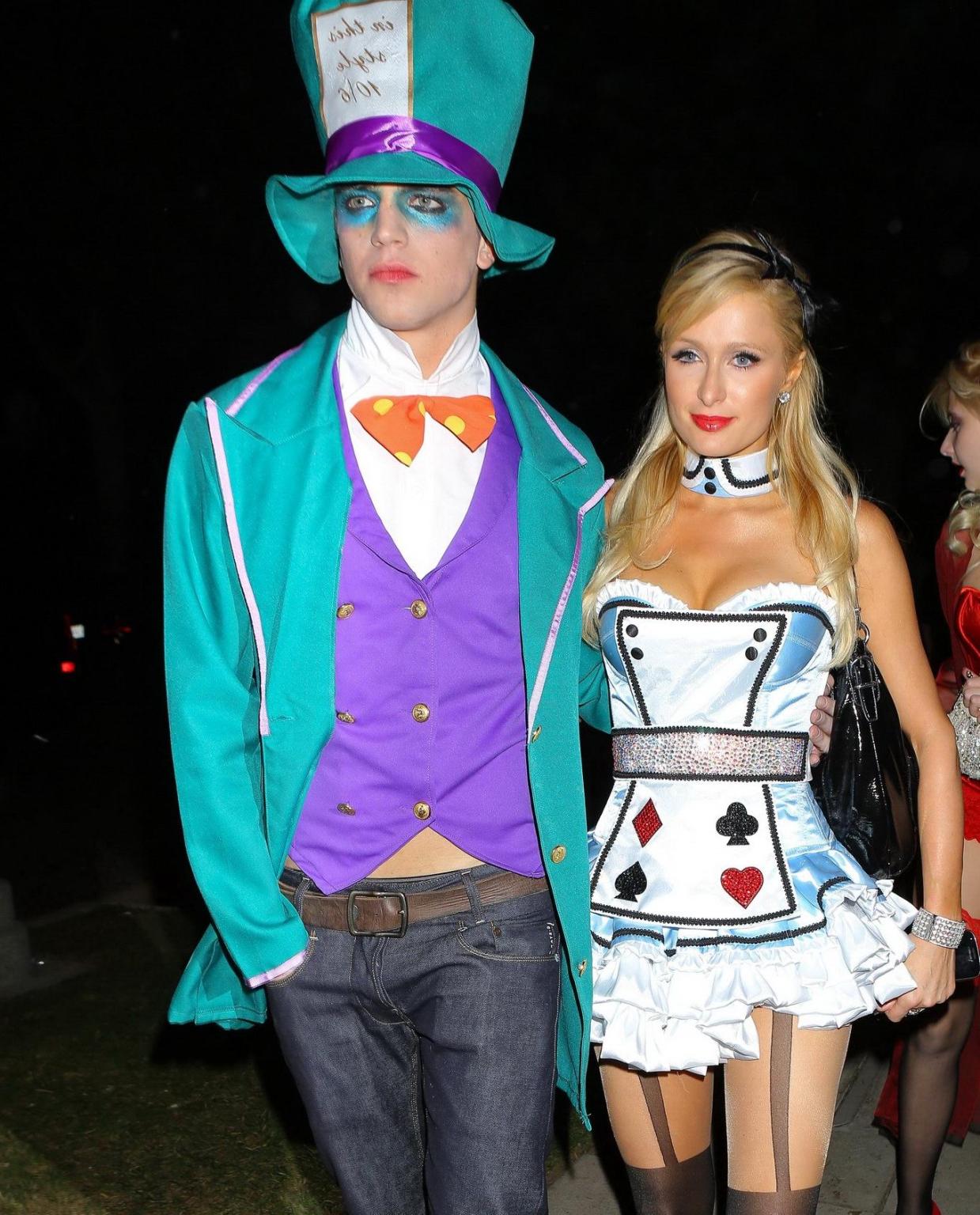 10P Paris Hilton dressed as Alice in Slutland for a Halloween party in Beverly Hills