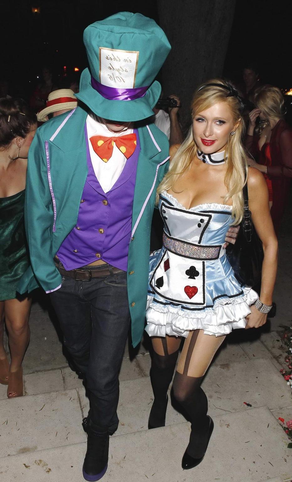 10P Paris Hilton dressed as Alice in Slutland for a Halloween party in Beverly Hills