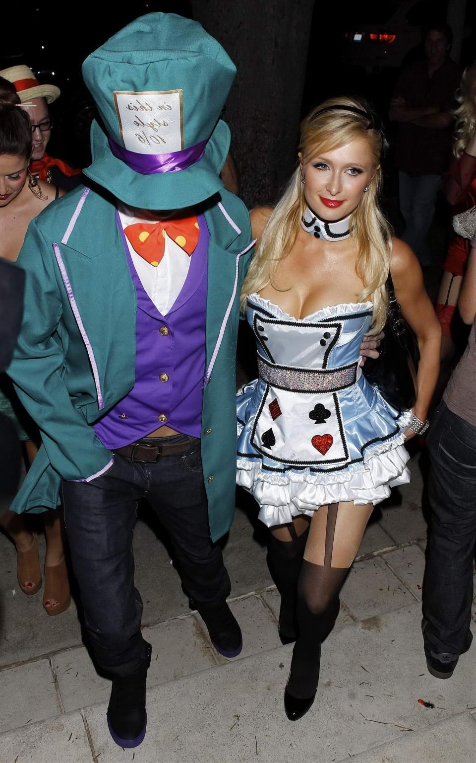 10P Paris Hilton dressed as Alice in Slutland for a Halloween party in Beverly Hills