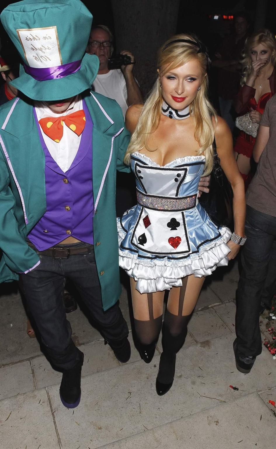 10P Paris Hilton dressed as Alice in Slutland for a Halloween party in Beverly Hills
