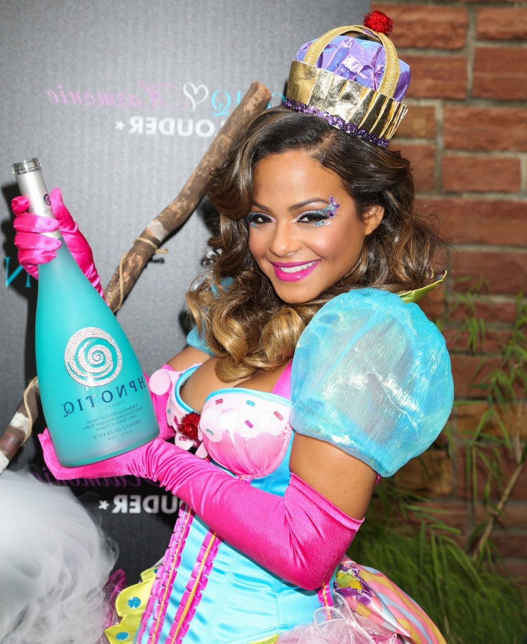 10P Christina Milian nipple slip at HPNOTIQ Liqueur Halloween Recipe Launch in Holly