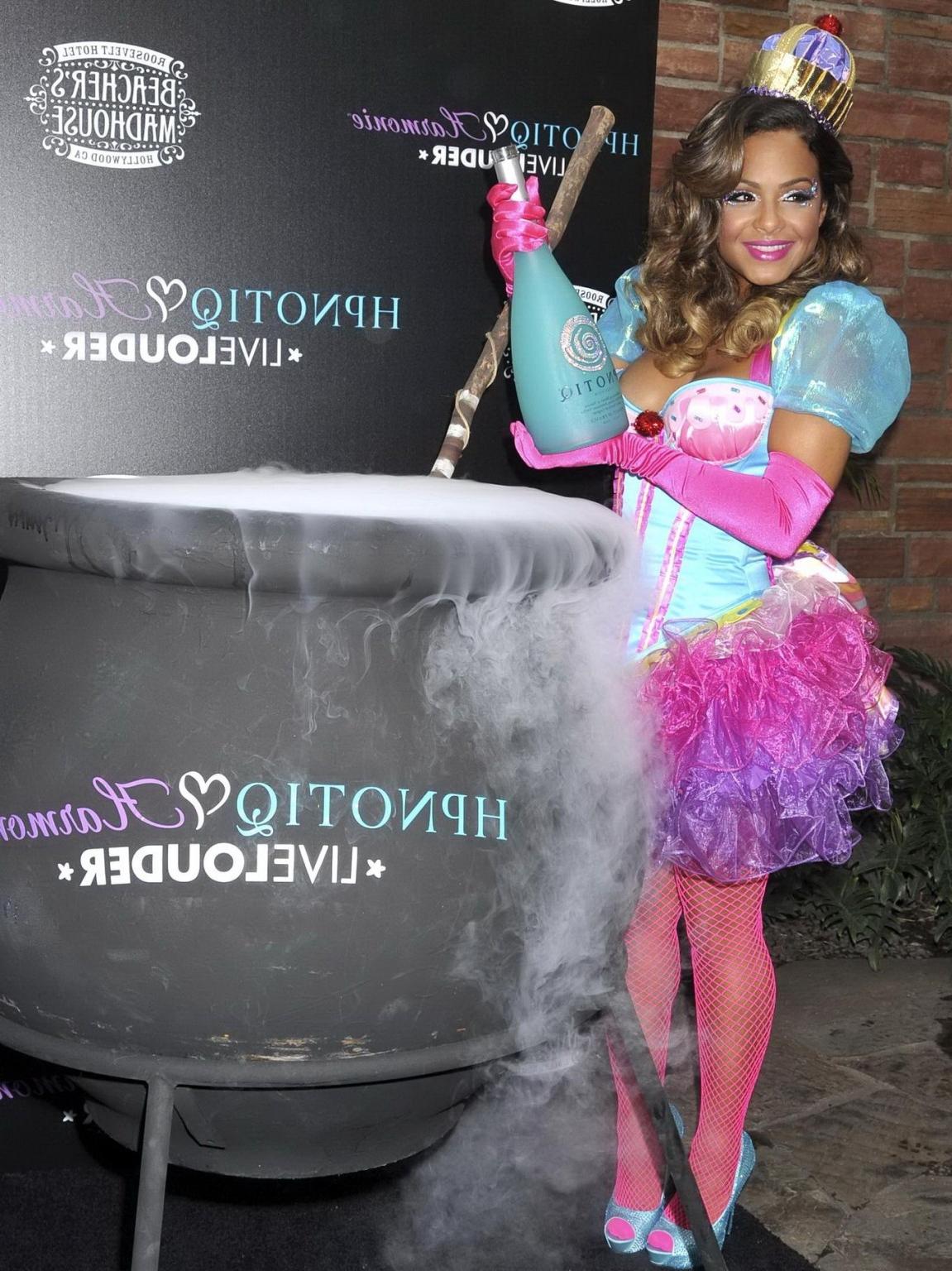 10P Christina Milian nipple slip at HPNOTIQ Liqueur Halloween Recipe Launch in Holly