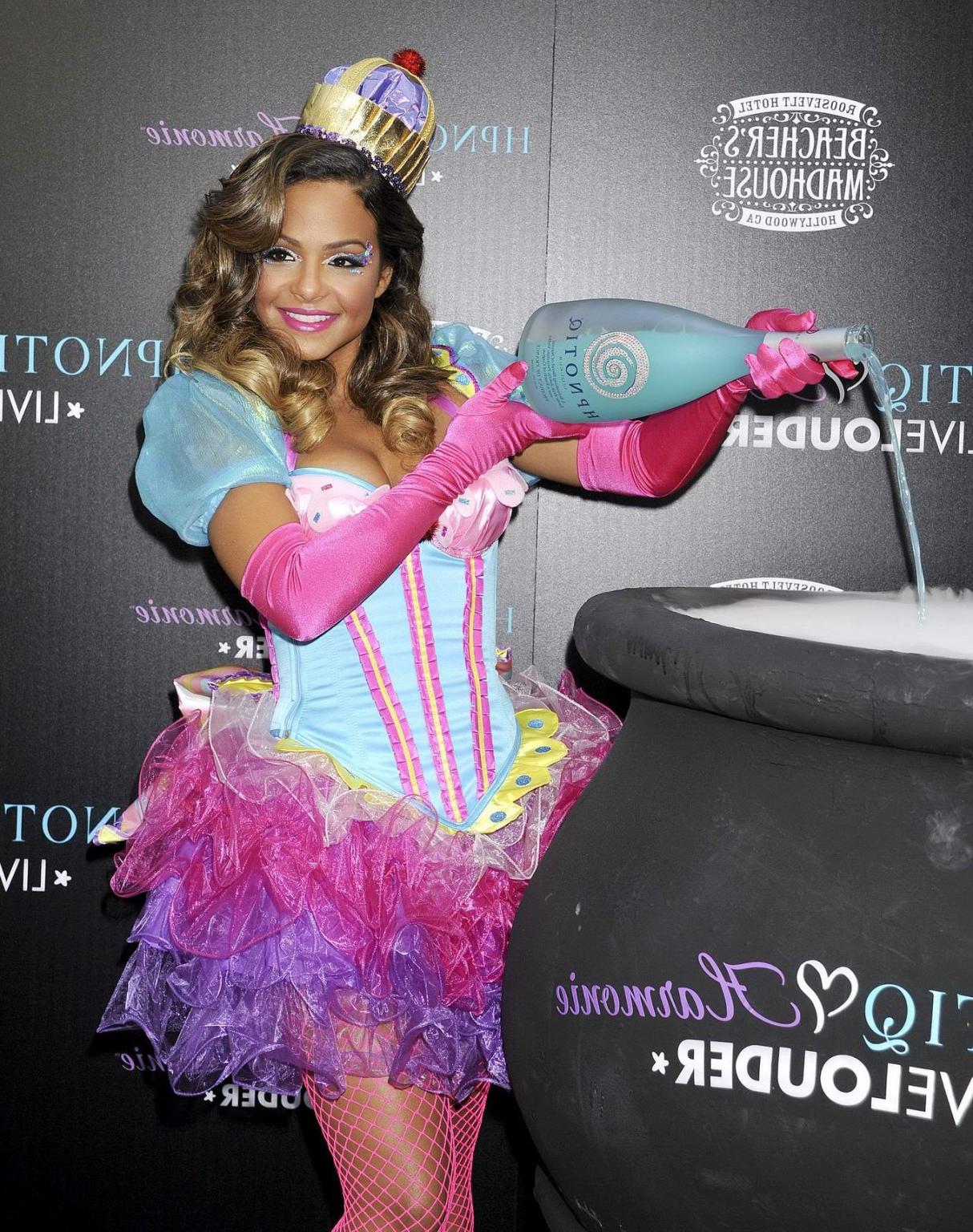 10P Christina Milian nipple slip at HPNOTIQ Liqueur Halloween Recipe Launch in Holly