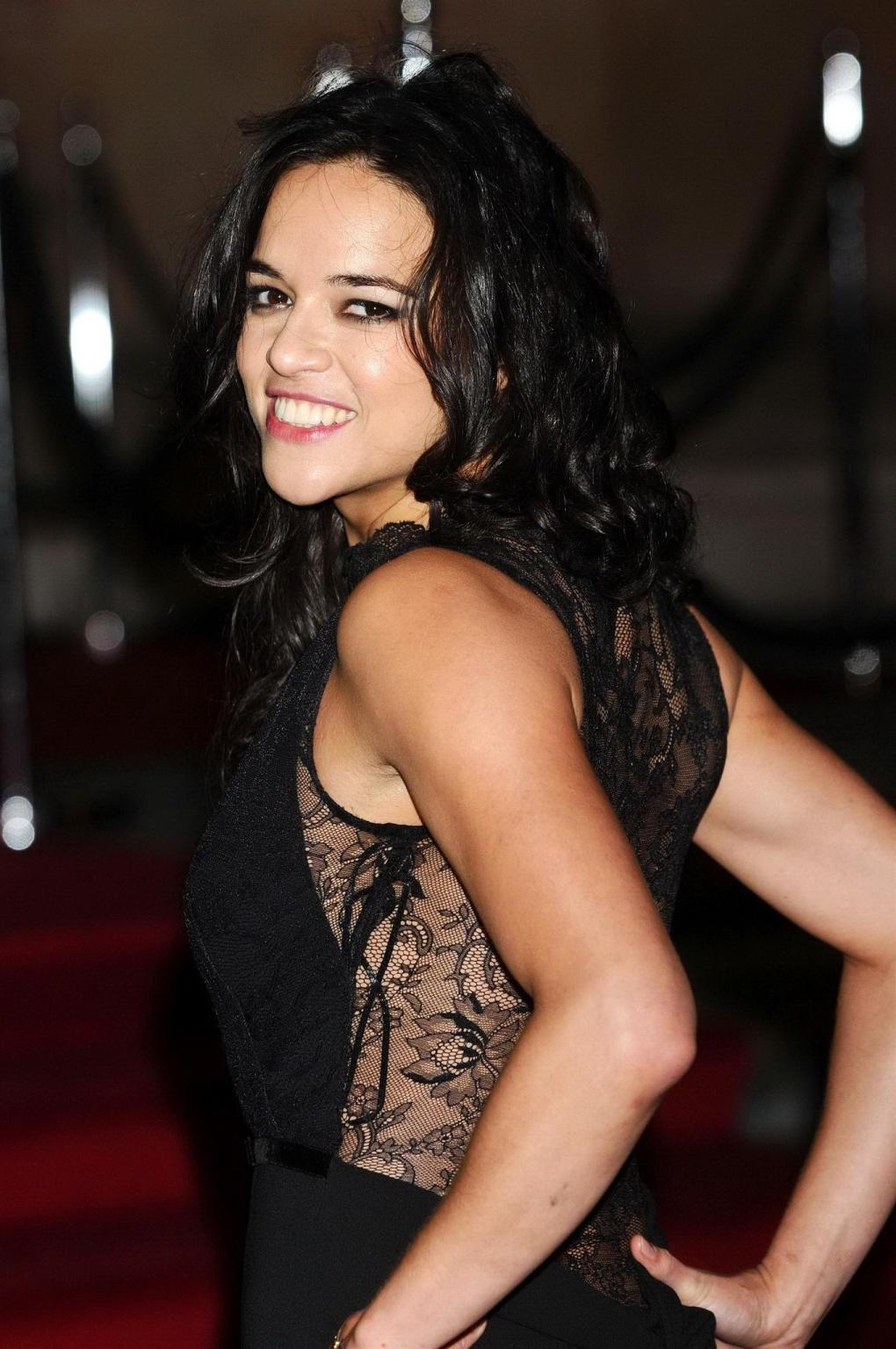 10P Michelle Rodriguez braless wearing a partially see through dress at Hollywood Co