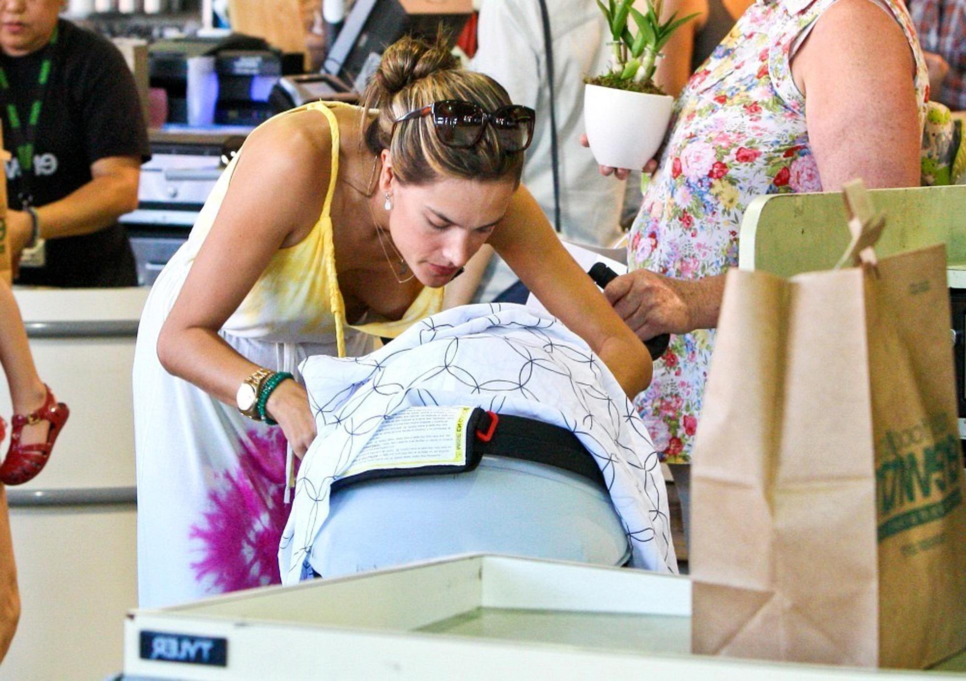 10P Alessandra Ambrosio downblouse nip slip while shopping in West Hollywood