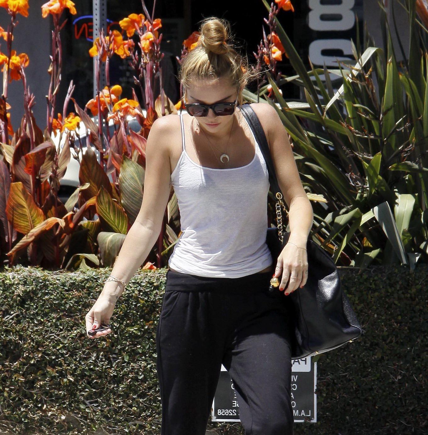 10P Miley Cyrus see through to bra out in Beverly Hills