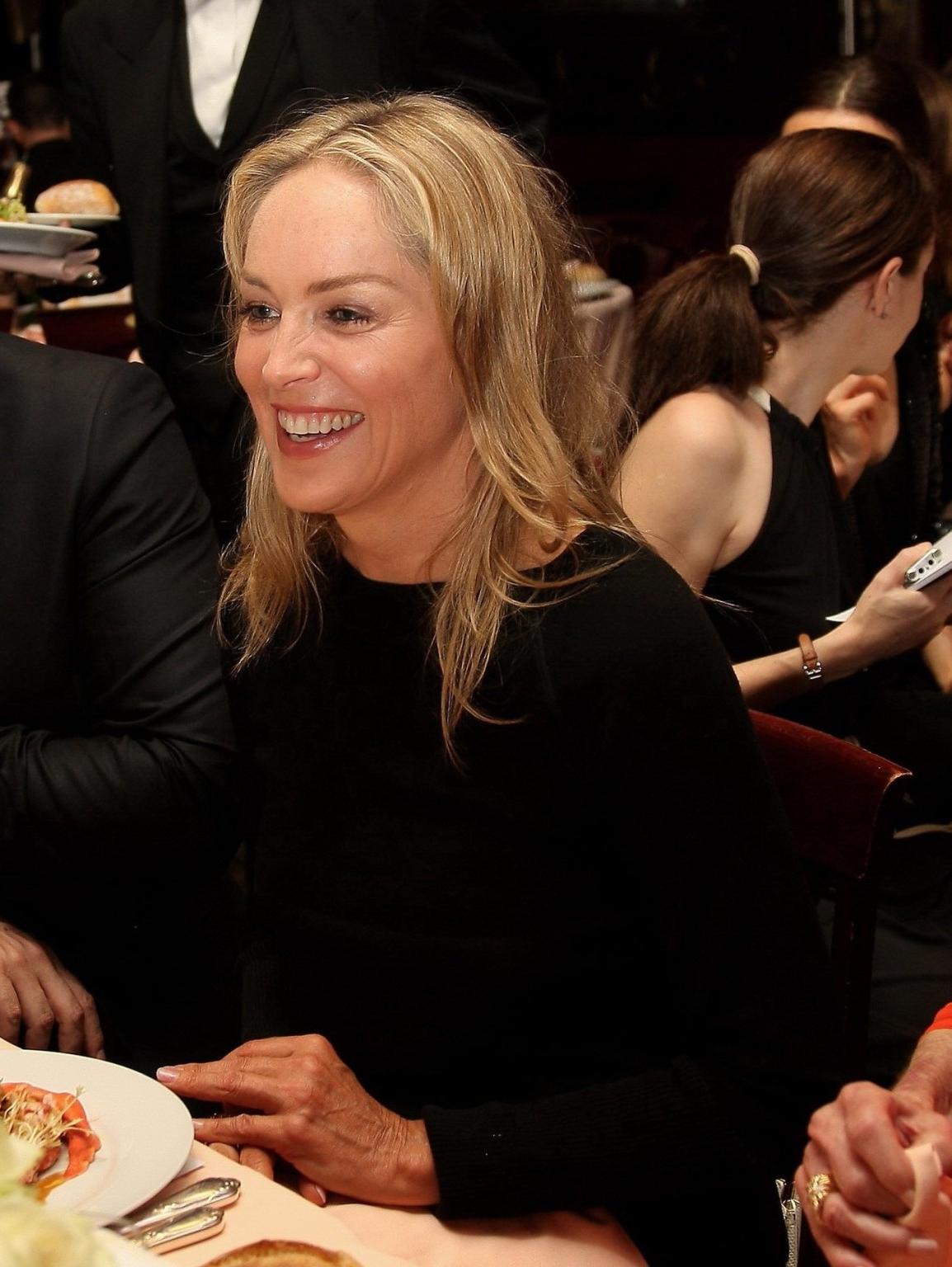 10P Sharon Stone showing off her boobs in see through top at  amfAR Inspiration Nigh