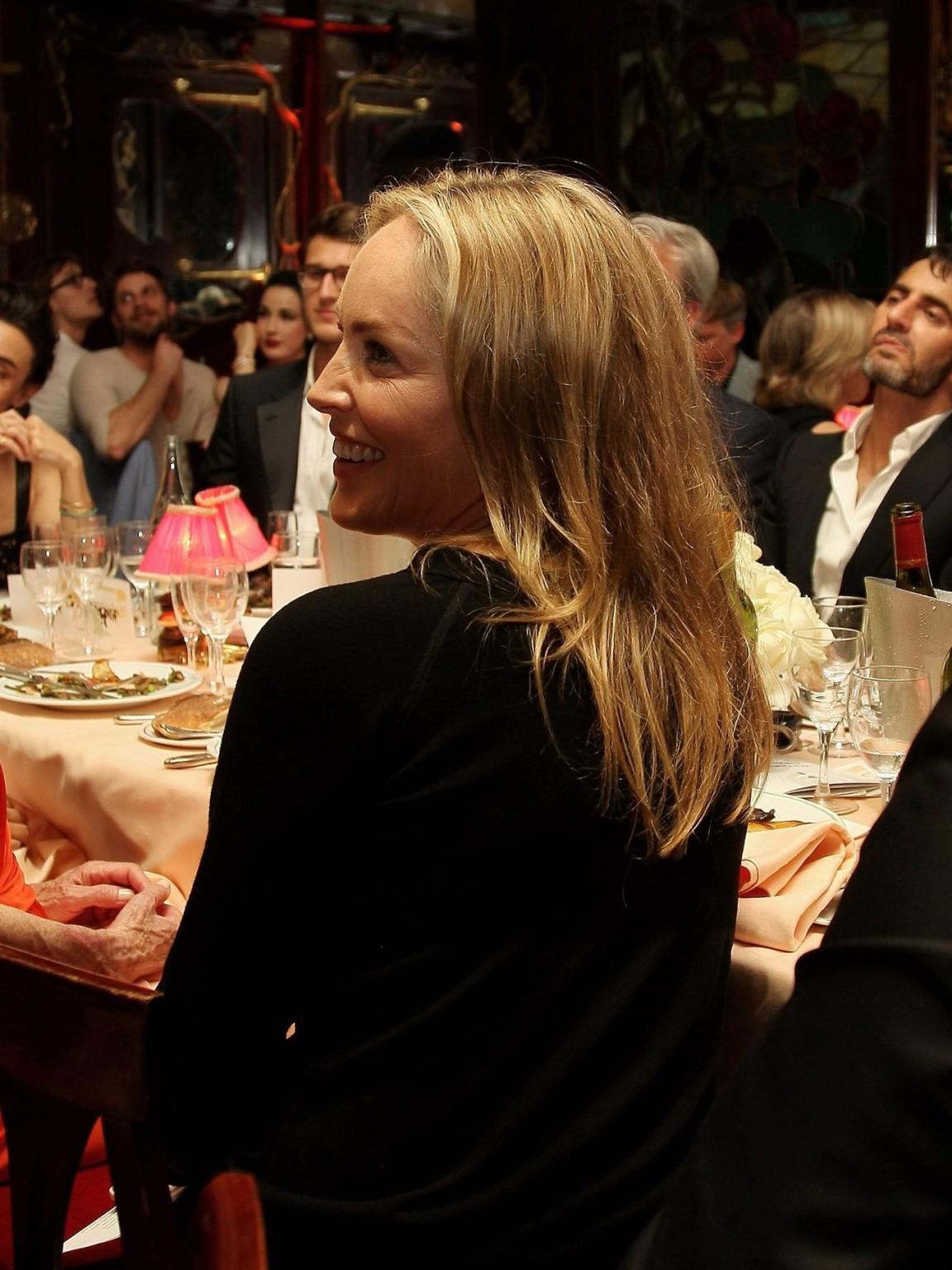10P Sharon Stone showing off her boobs in see through top at  amfAR Inspiration Nigh