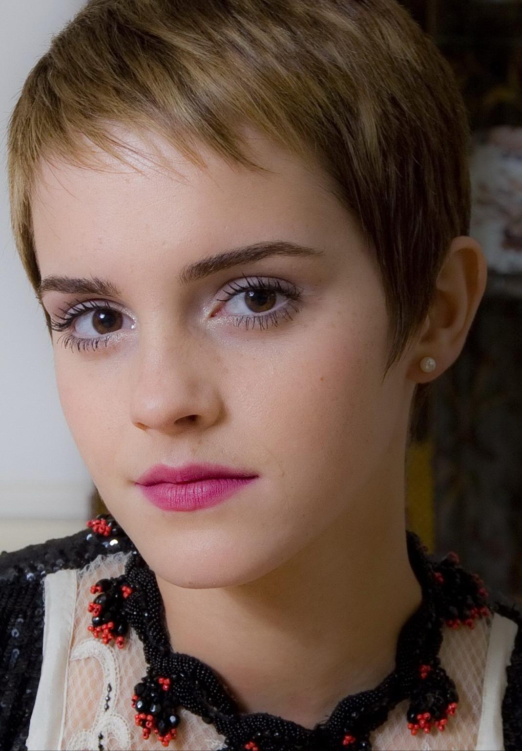 10P Emma Watson areola peak wearing a partly see through little dress for Joel Ryan 