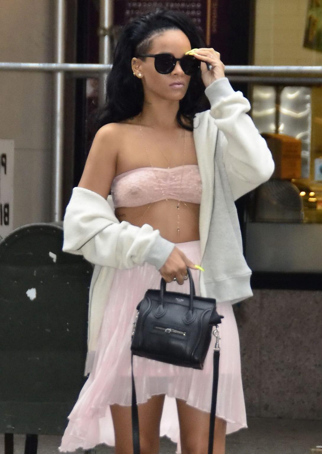 10P Rihanna wearing see through tube top out in New York City