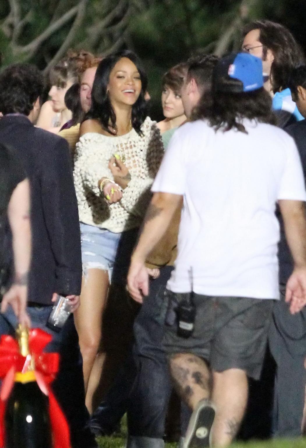 10P Rihanna wearing see through tube top out in New York City