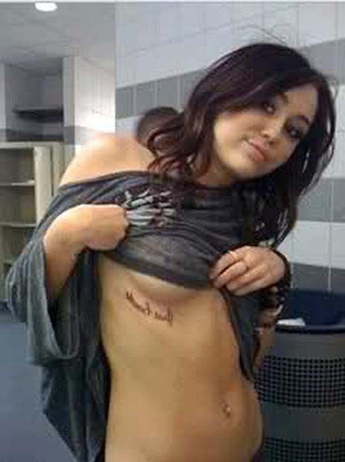 10P Miley Cyrus exposing her tattoo and boobs in see thru
