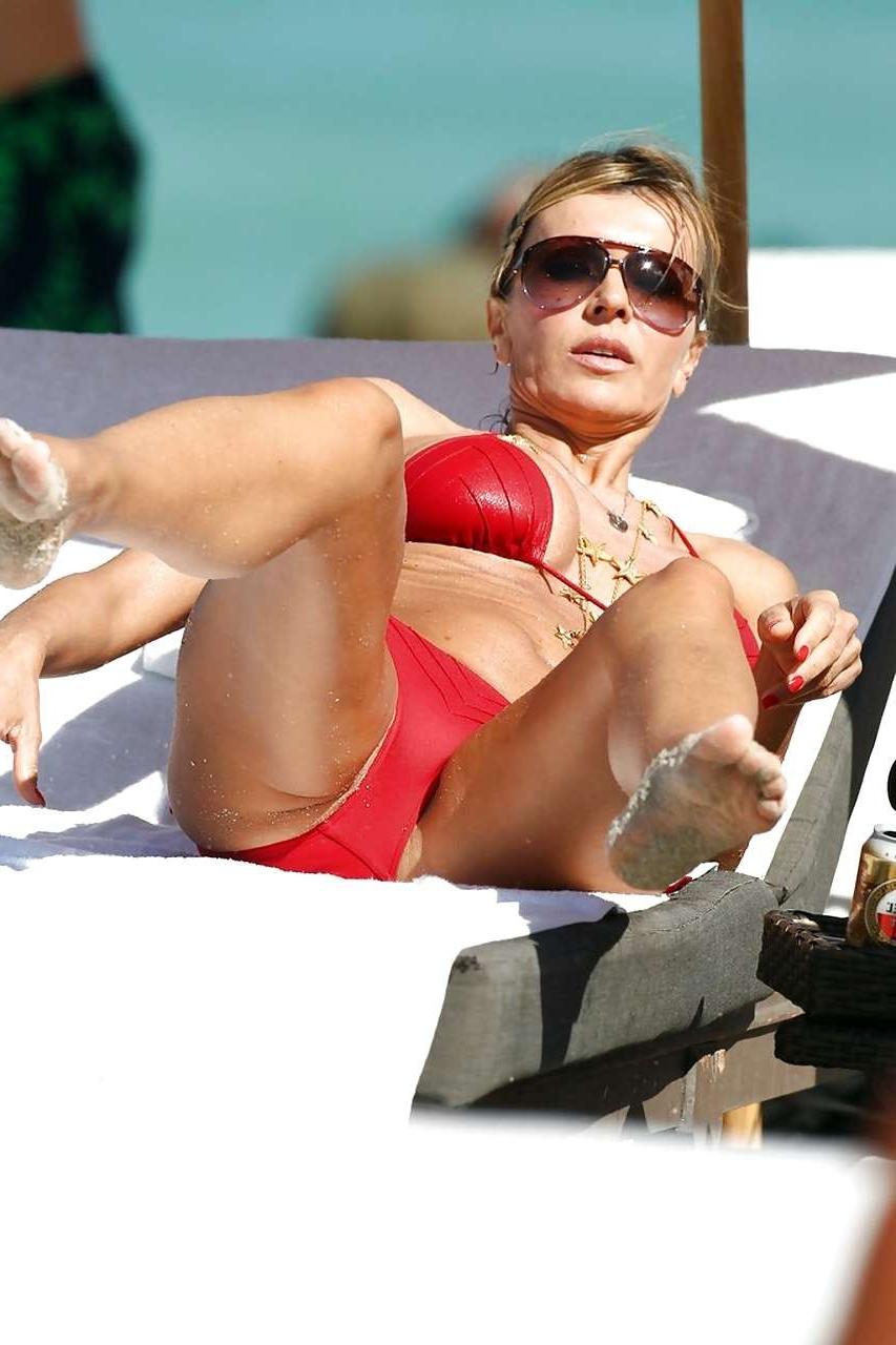 10P Rita Rusic exposing her big tit on beach oops paparazzi pictures