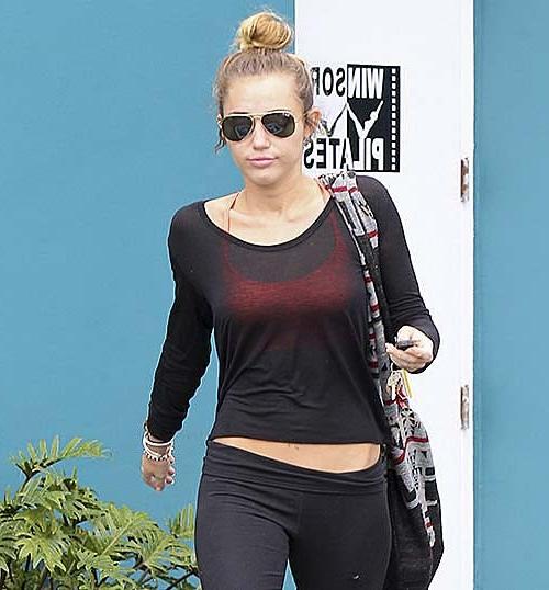 10P Miley Cyrus walking on street in sexy see thru blouse