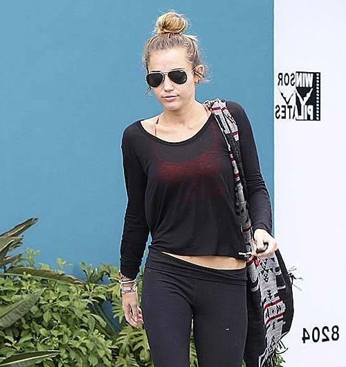 10P Miley Cyrus walking on street in sexy see thru blouse