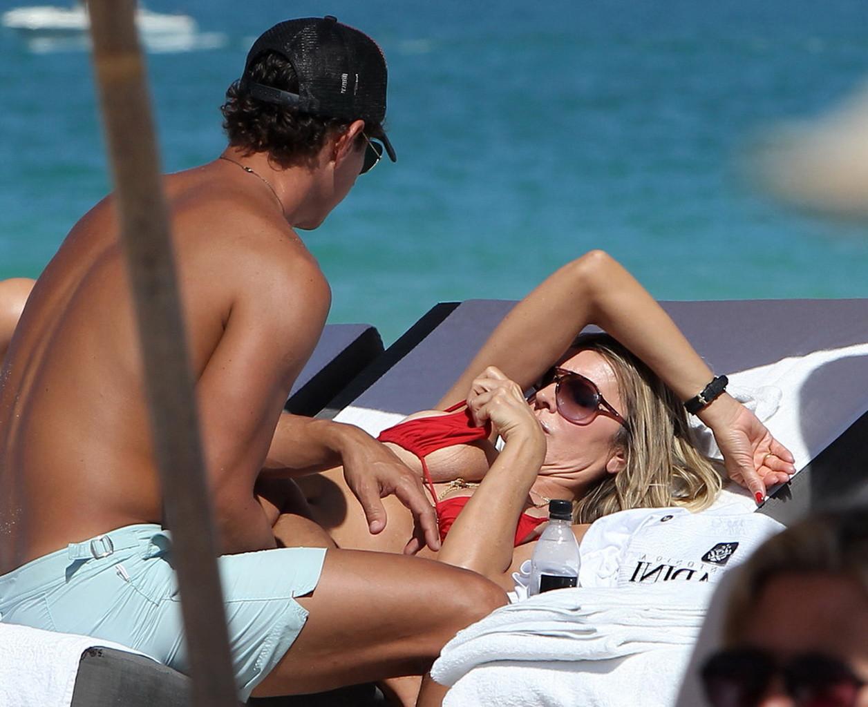 16P Rita Rusic nipple slip on a beach in Miami, Florida