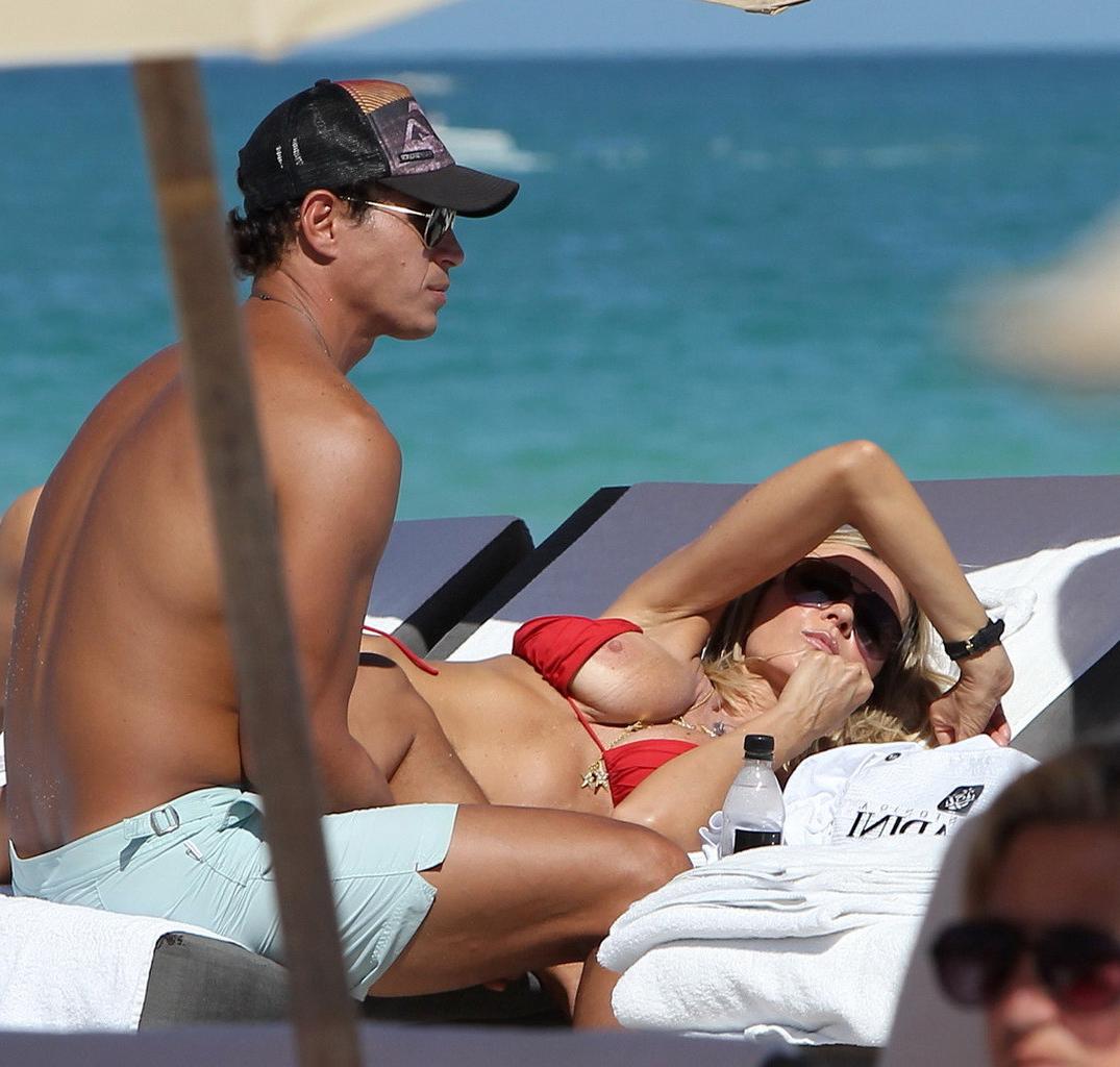 16P Rita Rusic nipple slip on a beach in Miami, Florida