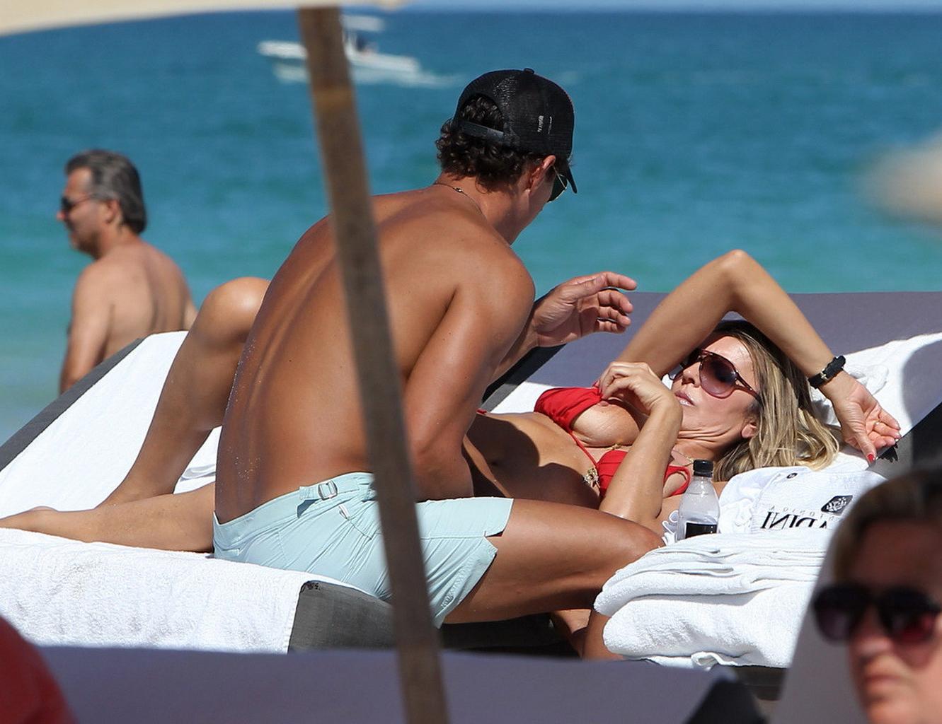 16P Rita Rusic nipple slip on a beach in Miami, Florida