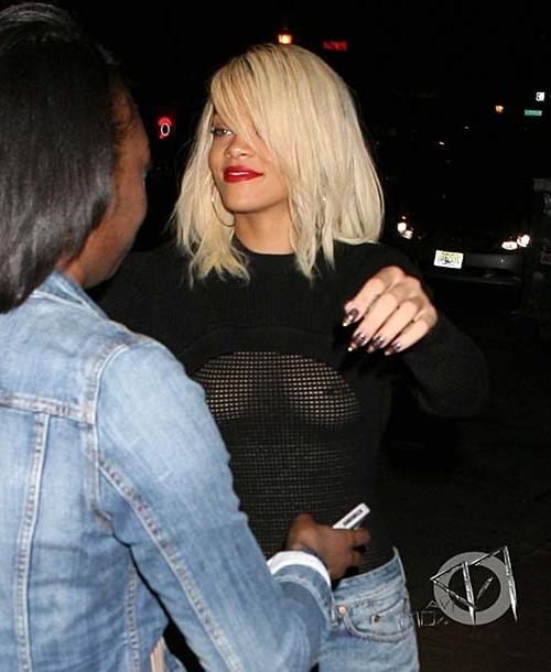 16P Rihanna walking down the street and showing hard nipples in see thru