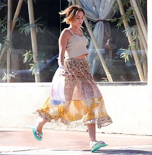 16P Miley Cyrus exposing sexy body and hot legs in see thru dress