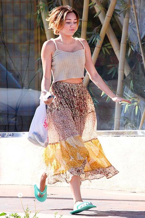 16P Miley Cyrus exposing sexy body and hot legs in see thru dress