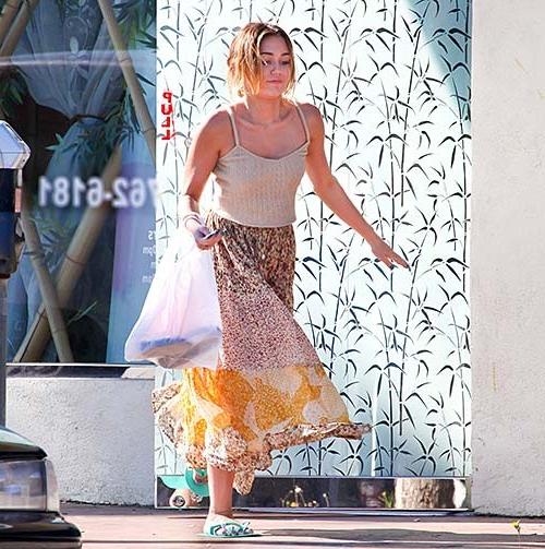 16P Miley Cyrus exposing sexy body and hot legs in see thru dress
