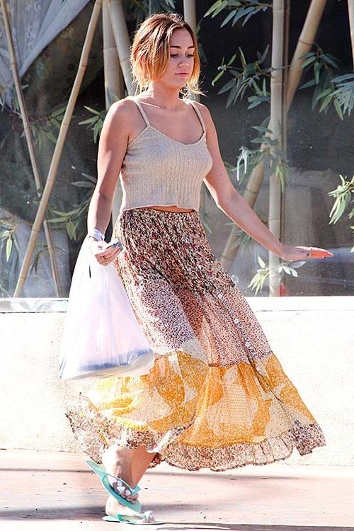 16P Miley Cyrus exposing sexy body and hot legs in see thru dress