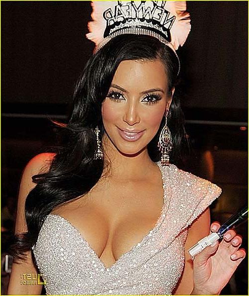 16P Kim Kardashian exposing huge boobs in bikini top on private photos