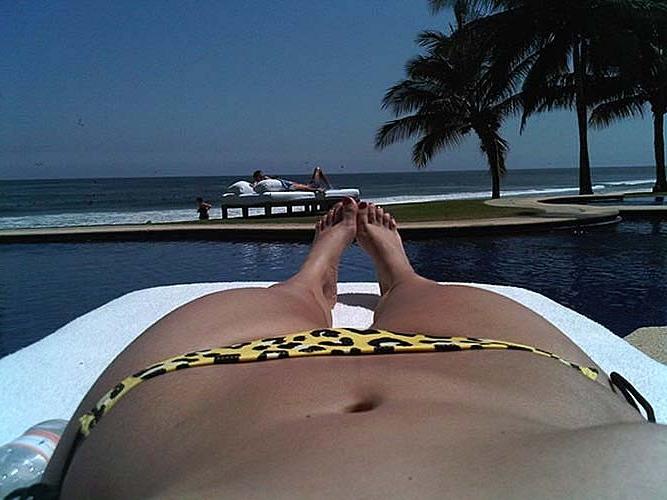 16P Kim Kardashian exposing huge boobs in bikini top on private photos