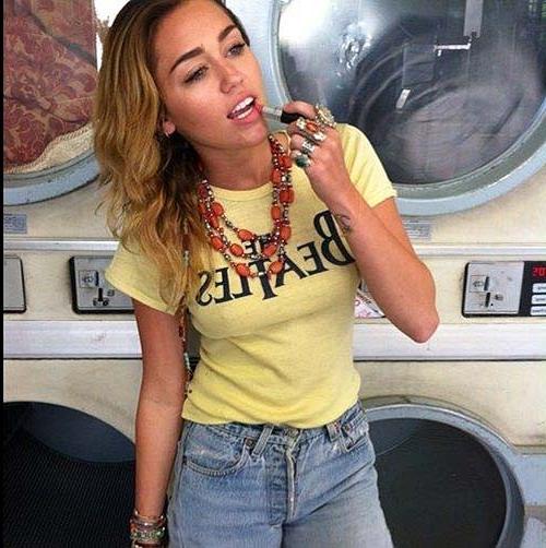 16P Miley Cyrus exposing sexy body and hard nipples in see thru blouse
