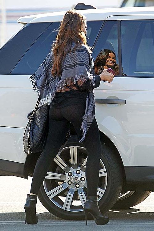 16P Sofia Vergara wearing see thru black tights on street paparazzi photos