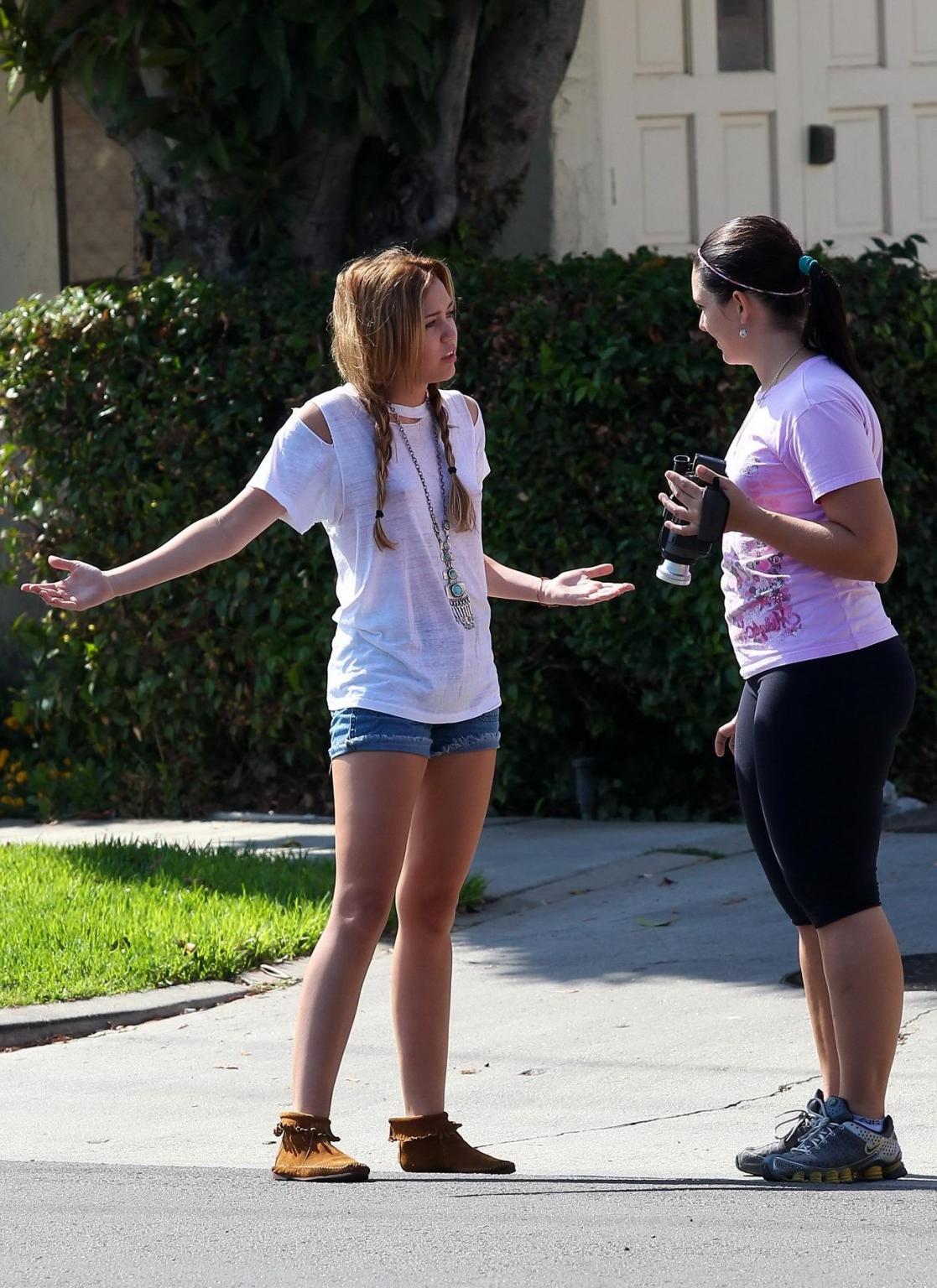 16P Miley Cyrus braless wearing see through T-shirt outside Patty's Rest in Toluca L