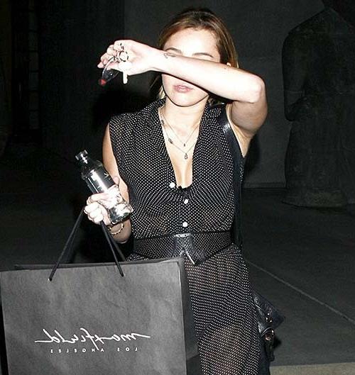 16P Miley Cyrus exposing sexy body and tiny tits in see thru blouse