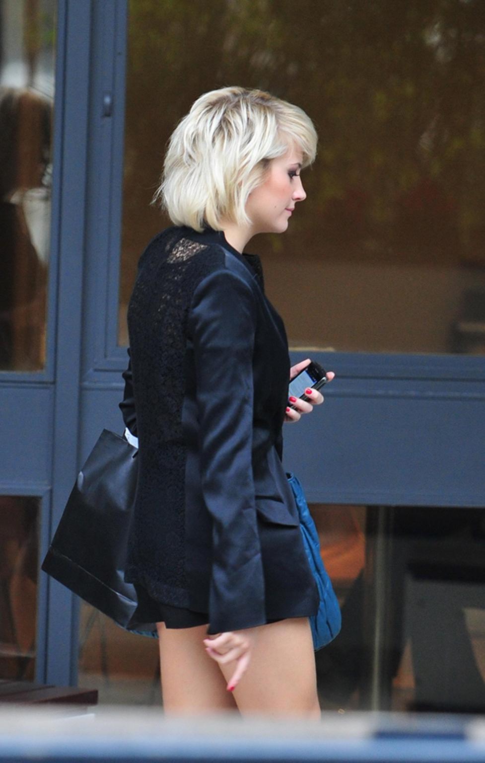 16P Pixie Lott wearing see-through to bra outside a recording studio in London