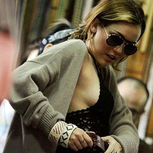 16P Miley Cyrus exposing sexy body and huge boobs on halloween party